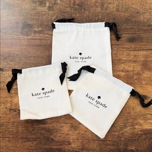 Kate Spade Cream Pouches with Black Ties